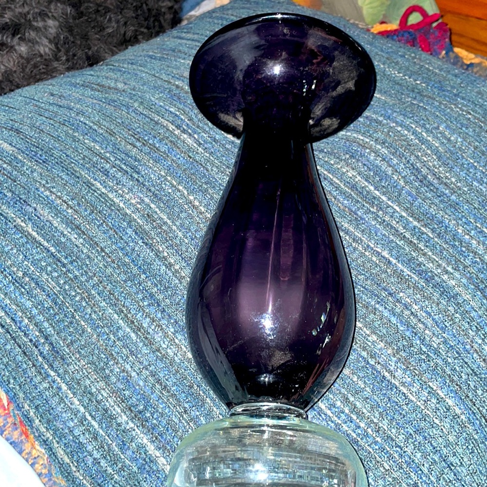 Amethyst vase with a clear bottom footing. Beautiful and rich in color.